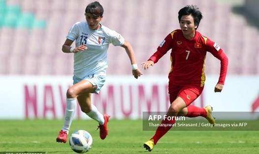 Tuyển nữ Việt Nam trong trận đấu với tuyển nữ Đài Loan. Ảnh: AFP
