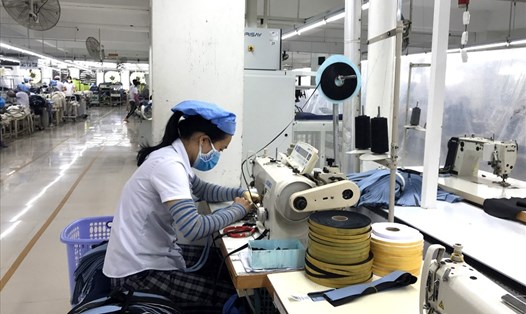Các doanh nghiệp ở Đà Nẵng "đau đầu" vì công nhân mắc COVID-19 tăng cao. Ảnh: Thanh Chung