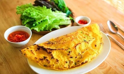 Bánh xèo là món ăn hấp dẫn tại Việt Nam. Ảnh: TL