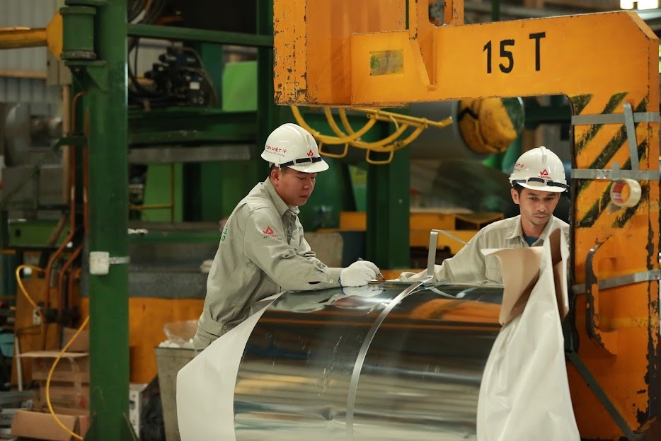 Phát triển sản xuất kinh doanh, tăng năng suất lao động. Ảnh: Phạm Đông