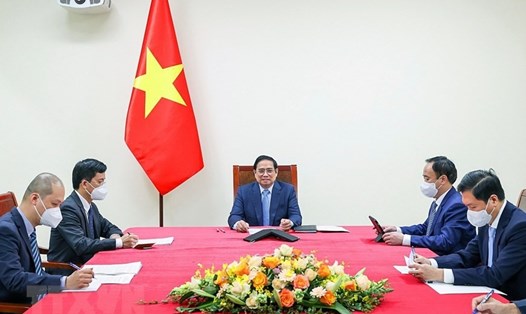 Thủ tướng Phạm Minh Chính điện đàm với Thủ tướng Lào Phankham Viphavan nhân Tết cổ truyền Bun Pi May; điện đàm với Thủ tướng Campuchia Hun Sen nhân Tết cổ truyền Chôl Chnăm Thmay. Ảnh: TTXVN