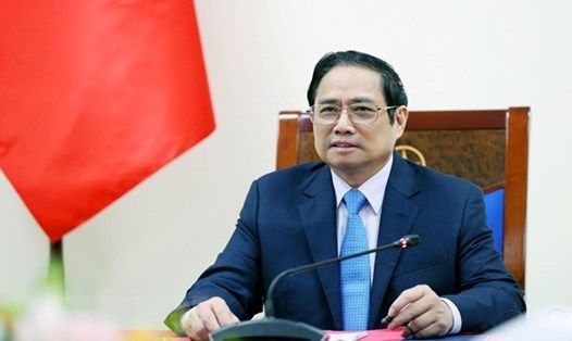 Thủ tướng Phạm Minh Chính đã tiến hành điện đàm với Thủ tướng Italia Mario Draghi. Ảnh: TTXVN