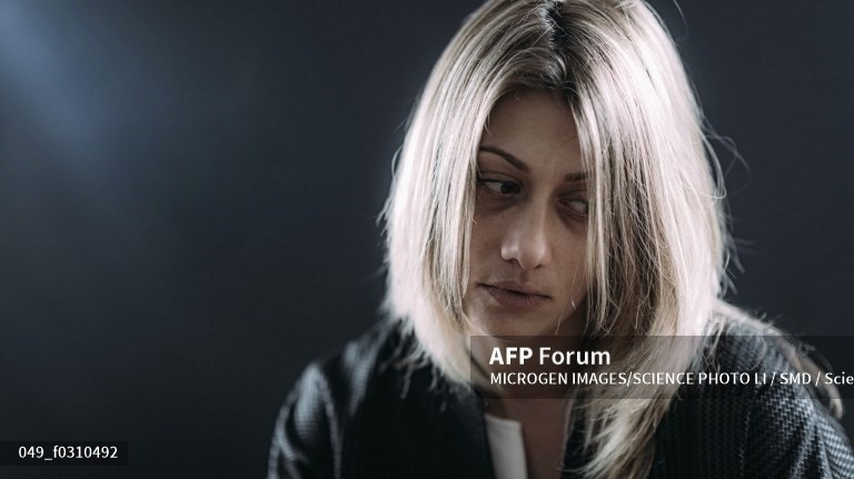 Đường dây nóng tư vấn sức khỏe tâm thần ở Thượng Hải cháy máy vì người dân trầm cảm trong đại dịch. Ảnh: AFP