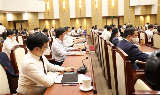 Các đại biểu HĐND TP.Hà Nội bấm nút thông qua Nghị quyết tại kỳ họp. Ảnh: BTC