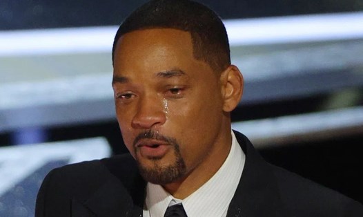 Will Smith khóc khi phát biểu nhận giải tại Oscar, sau khi tát Chris Rock. Ảnh: Reuters
