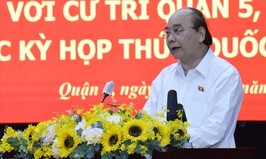 Chủ tịch nước Nguyễn Xuân Phúc phát biểu tại buổi tiếp xúc cử tri.   Ảnh: Hà Khánh