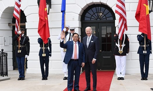 Tổng thống Mỹ Jose Biden đón Thủ tướng Phạm Minh Chính. Ảnh: TTXVN