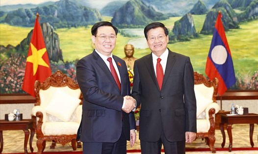 Tổng Bí thư, Chủ tịch nước Lào Thongloun Sisoulith và Chủ tịch Quốc hội Vương Đình Huệ. Ảnh: Doãn Tấn