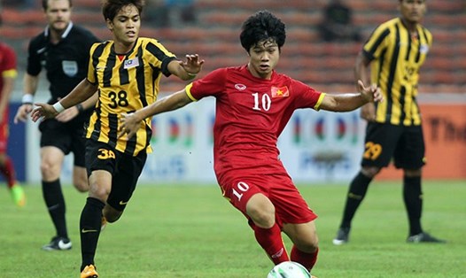 U23 Việt Nam và U23 Malaysia trong lần đối đầu tại SEA Games 2015. Ảnh: T.L