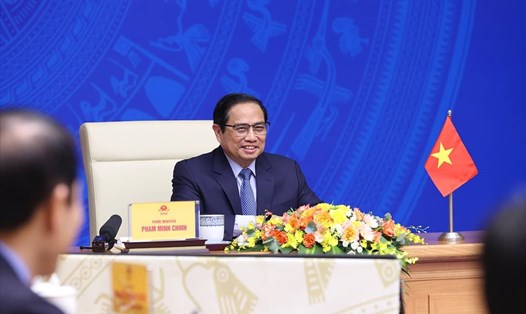 Thủ tướng Phạm Minh Chính tham dự và phát biểu theo hình thức trực tuyến tại lễ công bố khởi động thảo luận về IPEF. Ảnh: TTXVN