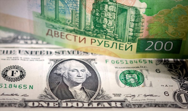 Dollar drops from 20-year high, falls against ruble