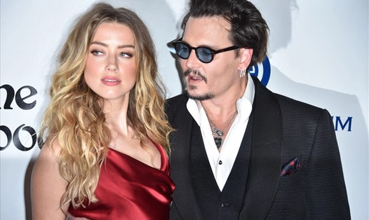 Amber Heard và Johnny Depp thuở còn mặn nồng. Ảnh: AFP.