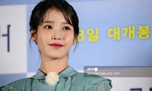 “Em gái quốc dân” IU được khen với vai diễn trong phim “Broker”. Ảnh: AFP.