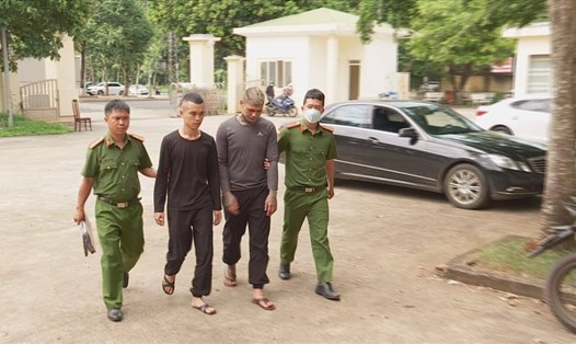 Trần Nam Giang và Trần Văn Hiệp bị lực lượng chức năng bắt giữ. Ảnh: T.X