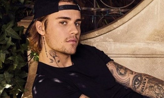 Nam ca sĩ Justin Bieber phải ngưng ca hát để điều trị bệnh. Ảnh: AFP.