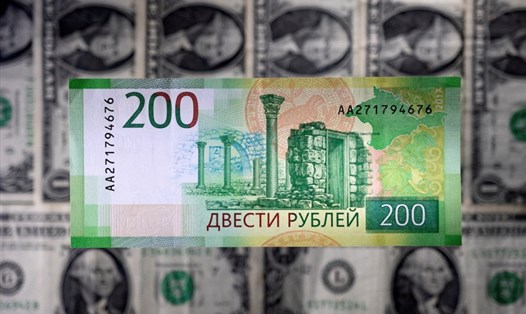 Đồng rúp Nga tăng giá so với đồng USD. Ảnh: AFP
