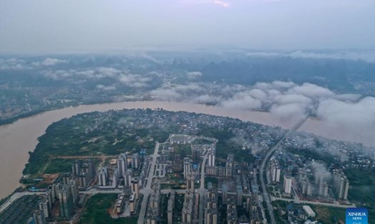 Trung Quốc đã nâng cấp ứng phó khẩn cấp để kiểm soát lũ lụt khi mưa lớn tiếp tục ảnh hưởng ở phía nam đất nước. Ảnh: Tân Hoa Xã