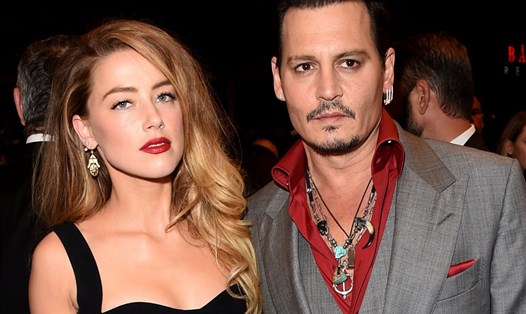 Amber Heard và Johnny Depp thuở còn mặn nồng. Ảnh: AP.