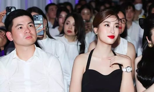 Hoa hậu Đỗ Mỹ Linh và bạn trai. Ảnh : LĐ