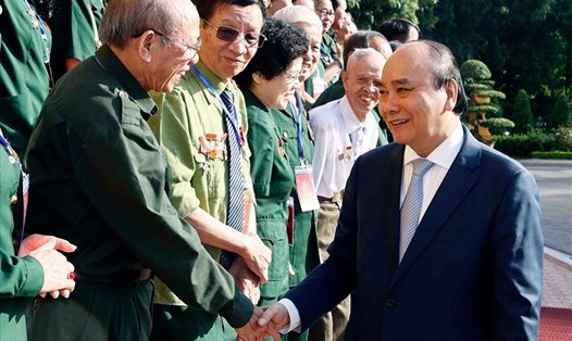 Chủ tịch nước Nguyễn Xuân Phúc với các đại biểu. Ảnh: Thống Nhất