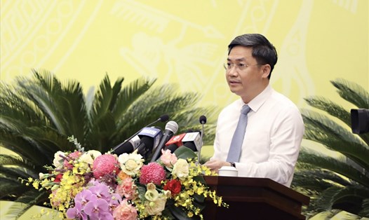 Phó Chủ tịch UBND TP Hà Minh Hải trình bày báo cáo tại kỳ họp thứ 7 HĐND TP khóa XVI. Ảnh: TTBC