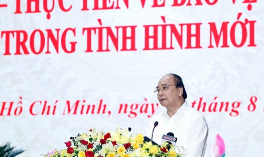 Chủ tịch nước Nguyễn Xuân Phúc phát biểu tại hội thảo. Ảnh: Thống Nhất