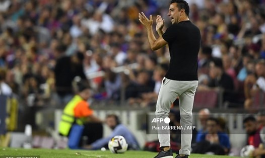 Xavi muốn dừng đồng hồ trong thời gian "bóng chết".  Ảnh: AFP