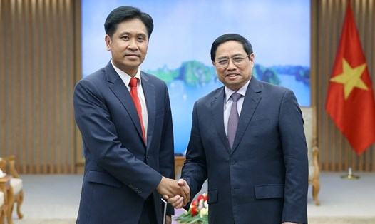 Thủ tướng Phạm Minh Chính tiếp Bộ trưởng Tư pháp Lào Phayvy Siboualypha. Ảnh: TTXVN