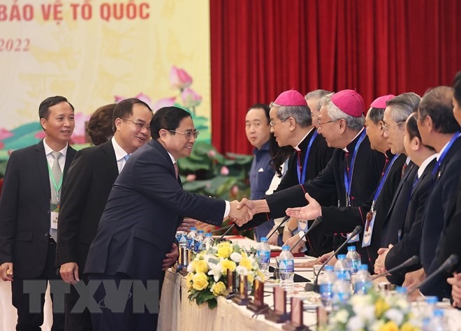 Thủ tướng Phạm Minh Chính tại Hội nghị biểu dương các tổ chức tôn giáo có đóng góp trong sự nghiệp xây dựng và bảo vệ Tổ quốc. Ảnh: TTXVN