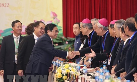 Thủ tướng Phạm Minh Chính tại Hội nghị biểu dương các tổ chức tôn giáo có đóng góp trong sự nghiệp xây dựng và bảo vệ Tổ quốc. Ảnh: TTXVN