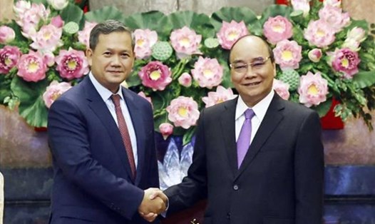 Chủ tịch nước Nguyễn Xuân Phúc tiếp Phó Tổng tư lệnh kiêm Tư lệnh Lục quân Quân đội Hoàng gia Campuchia Hun Manet, ngày 9.8.2022. Ảnh: TTXVN
