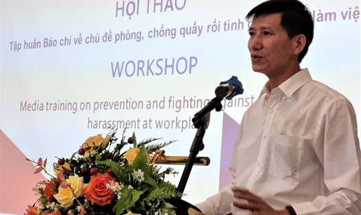 Ông Nguyễn Văn Bình - Vụ trưởng Vụ pháp chế Bộ LĐTBXH - phát biểu khai mạc hội thảo. Ảnh: Nam Dương