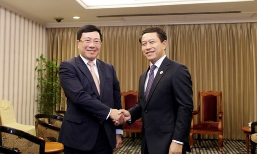 Phó Thủ tướng, Bộ trưởng Ngoại giao Phạm Bình Minh và Bộ trưởng Ngoại giao Lào Saleumxay Kommasith. Ảnh minh họa. Ảnh: VGP