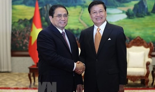 Thủ tướng Phạm Minh Chính hội kiến Tổng Bí thư, Chủ tịch nước Lào Thongloun Sisoulith. Ảnh: TTXVN