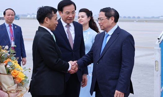 Thủ tướng Phạm Minh Chính về Hà Nội chiều 12.11, kết thúc tốt đẹp chuyến thăm chính thức Lào. Ảnh: VGP