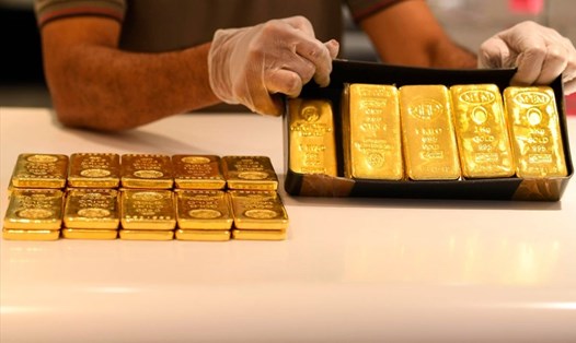 Giá vàng thế giới tăng hơn 50 USD/ounce so với đầu tuần. Ảnh: AFP