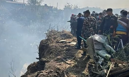 Hiện trường vụ rơi máy bay ở Nepal ngày 15.1.2023. Ảnh: AFP