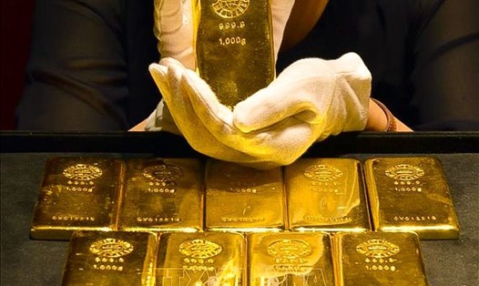 Giá vàng thế giới giảm nhẹ gần 3 USD/ounce trước áp lực chốt lời thu lợi nhuận. Ảnh: AFP