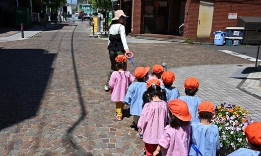 Trẻ em Nhật Bản. Ảnh: AFP