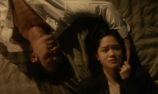 Trong "Đào, Phở và Piano" có nhiều cảnh nóng giữa Doãn Quốc Đam và nữ diễn viên Cao Thị Thùy Linh. Ảnh: đoàn phim cung cấp