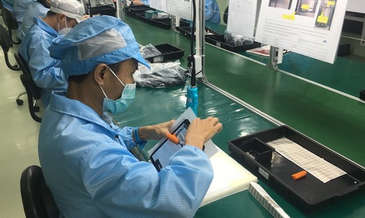 Một doanh nghiệp sản xuất máy tính bảng tại Đà Nẵng. Ảnh: Thanh Hải