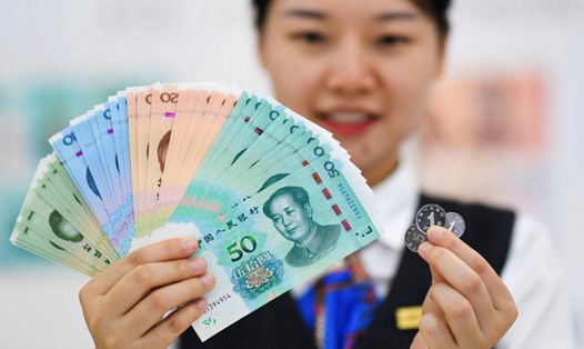 Đồng nhân dân tệ đã vượt qua đồng USD trong thanh toán nhập khẩu của Nga với Trung Quốc năm 2022. Ảnh: Xinhua