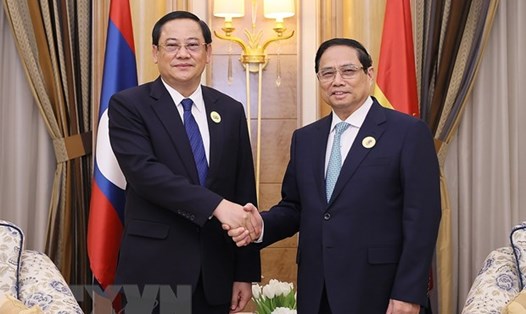 Thủ tướng Chính phủ Phạm Minh Chính và Thủ tướng Lào Sonexay Siphandone. Ảnh: TTXVN