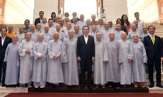 Phó Thủ tướng Chính phủ Trần Lưu Quang cùng các đại biểu dự buổi gặp mặt. Ảnh: Thanh Hà
