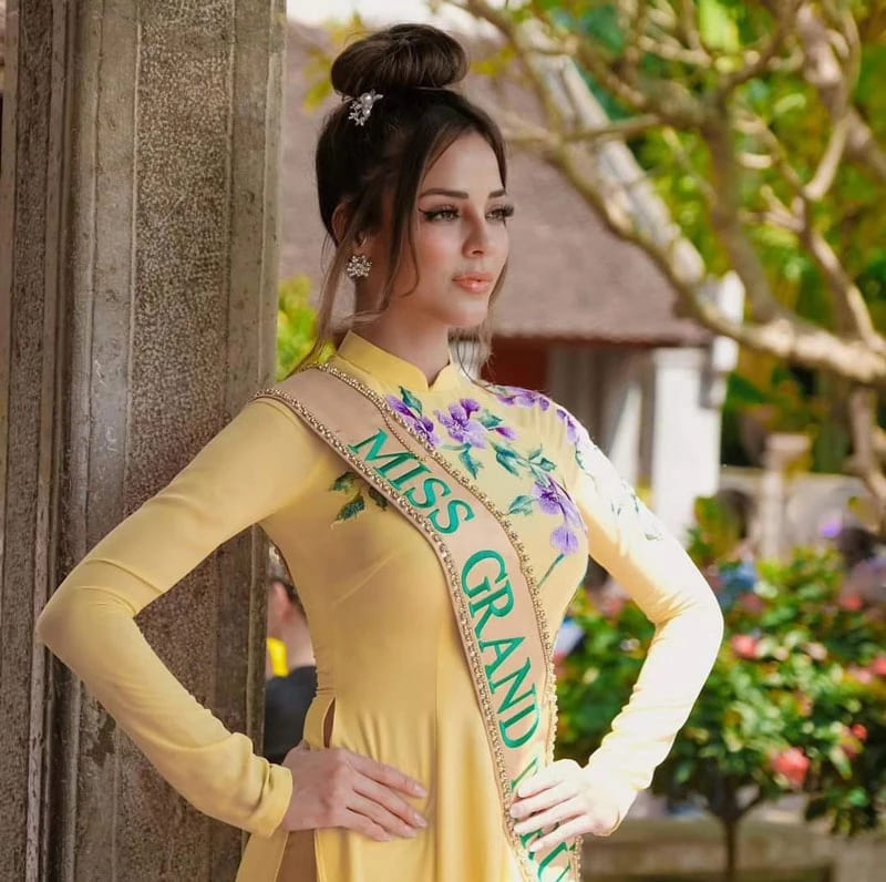 Tân hoa hậu mặc áo dài Việt Nam trong quá trình thi Miss Grand International 2023. Ảnh: MGI