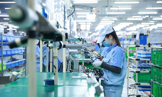 Thêm chính sách hỗ trợ doanh nghiệp sản xuất kinh doanh để đạt mục tiêu tăng trưởng kinh tế 2024 cao nhất. Ảnh: Hải Nguyễn