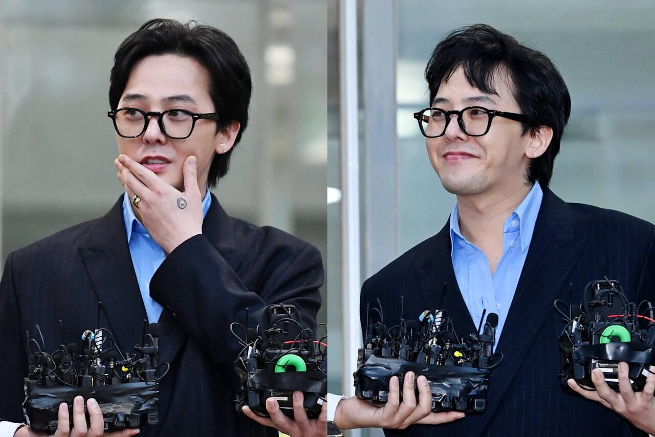 Thủ lĩnh Big Bang hạnh phúc sau buổi thẩm vấn chiều 6.11. Ảnh: Naver