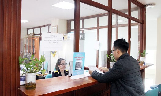 Người dân thực hiện thủ tục hành chính tại cơ quan thuế tỉnh Bắc Giang. Ảnh: Cục Thuế tỉnh Bắc Giang.