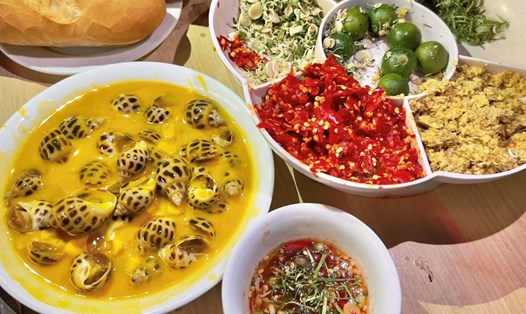 Ốc Thuỳ Linh 96 nổi tiếng với món ốc hương trứng muối. Ảnh: Hoàng Yến