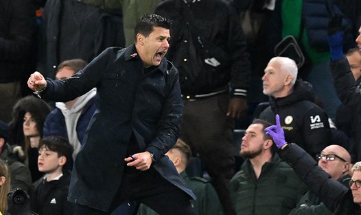 Pochettino ăn mừng cuồng nhiệt khi Chelsea ấn định trận hòa 4-4 trước Man City ở phút cuối. Ảnh: AFP
